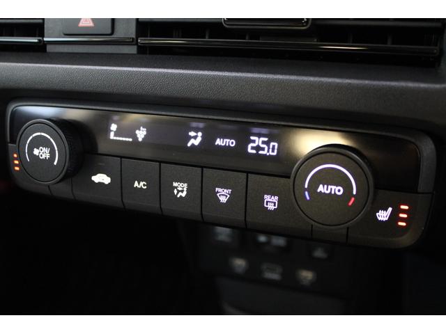 Ｈｏｎｄａ ｅ アドバンス　純正ナビ　マルチビュー　ＥＴＣ２．０　デジタルインナーミラー　パドルシフト　ステアリングヒーター　シートヒーター　フルセグ　Ｂｌｕｅｔｏｏｔｈ　バックカメラ　純正アルミ　ホンダコネクト　ガラスルーフ（15枚目）