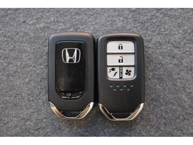 Ｈｏｎｄａ ｅ アドバンス　純正ナビ　マルチビュー　ＥＴＣ２．０　デジタルインナーミラー　パドルシフト　ステアリングヒーター　シートヒーター　フルセグ　Ｂｌｕｅｔｏｏｔｈ　バックカメラ　純正アルミ　ホンダコネクト　ガラスルーフ（36枚目）