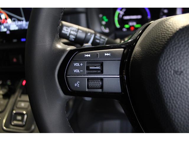 ステップワゴン ｅ：ＨＥＶスパーダ　純正ナビ　リヤ席モニター　マルチビュー　フルセグ　両側電動スライドドア　ＥＴＣ　シートヒーター　ブラインドスポットモニター　パワーテールゲート　Ｂｌｕｅｔｏｏｔｈ　スマートキー　１オーナー　ＥＳＣ（9枚目）