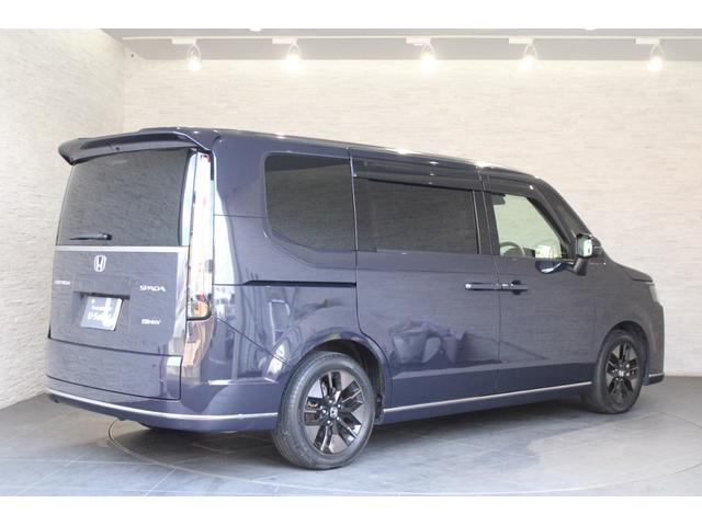 ステップワゴン ｅ：ＨＥＶスパーダ　純正ナビ　リヤ席モニター　マルチビュー　フルセグ　両側電動スライドドア　ＥＴＣ　シートヒーター　ブラインドスポットモニター　パワーテールゲート　Ｂｌｕｅｔｏｏｔｈ　スマートキー　１オーナー　ＥＳＣ（31枚目）