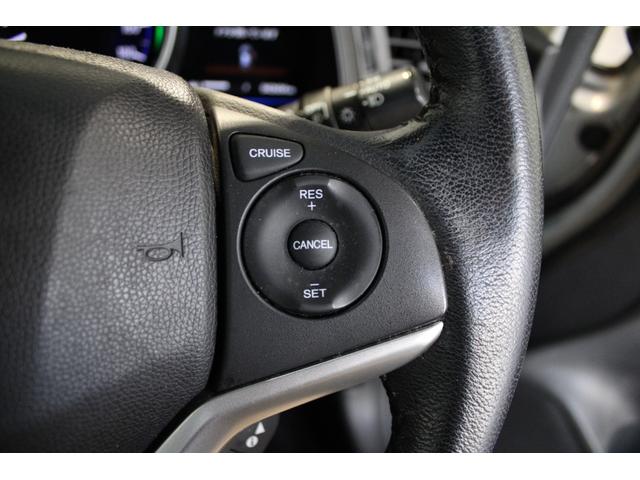 フィットハイブリッド Ｌパッケージ　雹損害有　純正ナビ　フルセグ　バックカメラ　クルコン　ワンオーナー　Ｂｌｕｅｔｏｏｔｈ　オートリトラミラー　１オーナ　ナビ＆ＴＶ　ＤＶＤ再生　ＬＥＤ　ＥＣＯＮ　オートクルーズコントロール　ＥＴＣ（8枚目）