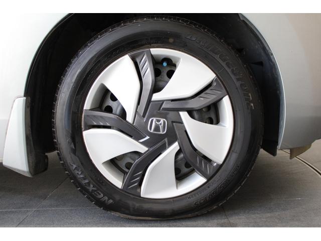 フィットハイブリッド Ｌパッケージ　雹損害有　純正ナビ　フルセグ　バックカメラ　クルコン　ワンオーナー　Ｂｌｕｅｔｏｏｔｈ　オートリトラミラー　１オーナ　ナビ＆ＴＶ　ＤＶＤ再生　ＬＥＤ　ＥＣＯＮ　オートクルーズコントロール　ＥＴＣ（29枚目）