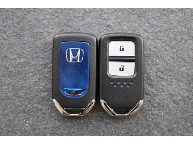 フィットハイブリッド Ｌパッケージ　雹損害有　純正ナビ　フルセグ　バックカメラ　クルコン　ワンオーナー　Ｂｌｕｅｔｏｏｔｈ　オートリトラミラー　１オーナ　ナビ＆ＴＶ　ＤＶＤ再生　ＬＥＤ　ＥＣＯＮ　オートクルーズコントロール　ＥＴＣ（31枚目）