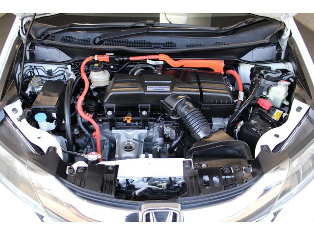 オデッセイハイブリッド ハイブリッドアブソルート・ホンダセンシンアドバンスP 後席モニター 純正ナビ マルチビューカメラ 両側電動スライドドア ETC パワーシート オットマン ホンダセンシング 衝突軽減ブレーキ 純正アルミ Bluetooth スマートキー 地デジ クルコン(32枚目)