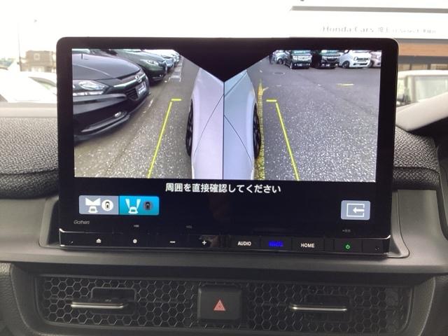 ステップワゴン ｅ：ＨＥＶエアー　純正１１．４インチナビ・デモカーＵＰ・禁煙車・マルチビューカメラ・渋滞追従・レーンアシスト・サイド＆カーテンエアバック・ＭＴモード・アルミホイール・ドラレコ・ミュージックプレイヤー接続・ＬＥＤライト・（12枚目）