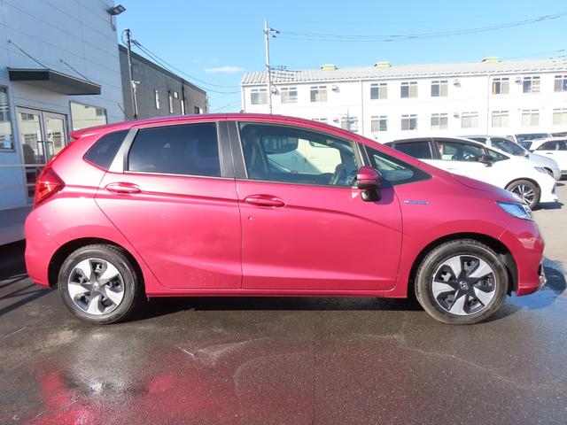 フィットハイブリッド Ｌ　ホンダセンシング　ハイブリッド　ＥＴＣ　バックカメラ　ＴＶ　オートクルーズコントロール　レーンアシスト　衝突被害軽減システム　オートライト　ＬＥＤヘッドランプ　スマートキー　アイドリングストップ　電動格納ミラー　ＡＴ（15枚目）