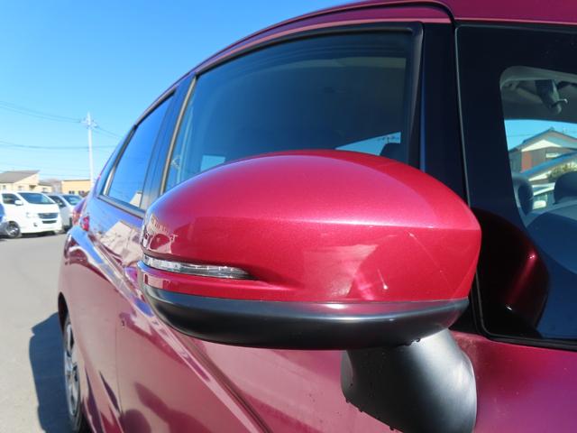 フィットハイブリッド Ｌ　ホンダセンシング　ハイブリッド　ＥＴＣ　バックカメラ　ＴＶ　オートクルーズコントロール　レーンアシスト　衝突被害軽減システム　オートライト　ＬＥＤヘッドランプ　スマートキー　アイドリングストップ　電動格納ミラー　ＡＴ（21枚目）