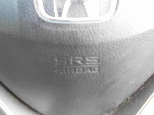 フリードハイブリッド ジャストセレクション 新品ワンセグ付ナビ 新品ドラレコ パワースライドドア スマートキー ETC ウィンカーミラー 社外15インチアルミ 純正HID リアスポイラー チェーンベルト(18枚目)