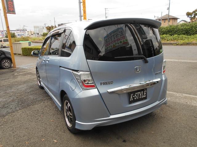 フリードハイブリッド ジャストセレクション 新品ワンセグ付ナビ 新品ドラレコ パワースライドドア スマートキー ETC ウィンカーミラー 社外15インチアルミ 純正HID リアスポイラー チェーンベルト(23枚目)