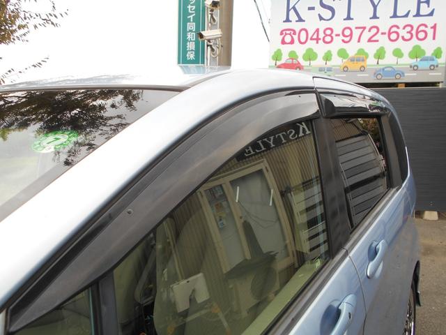 フリードハイブリッド ジャストセレクション 新品ワンセグ付ナビ 新品ドラレコ パワースライドドア スマートキー ETC ウィンカーミラー 社外15インチアルミ 純正HID リアスポイラー チェーンベルト(25枚目)