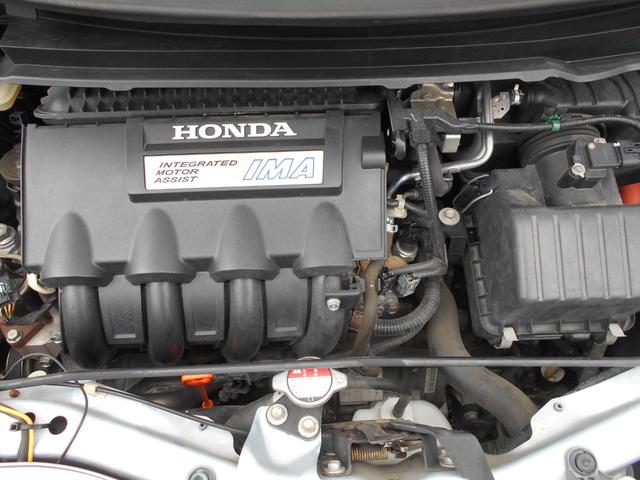 フリードハイブリッド ジャストセレクション 新品ワンセグ付ナビ 新品ドラレコ パワースライドドア スマートキー ETC ウィンカーミラー 社外15インチアルミ 純正HID リアスポイラー チェーンベルト(27枚目)