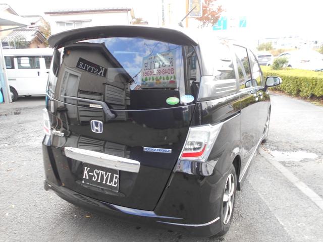 フリードスパイクハイブリッド ジャストセレクション 純正9インチナビ フルセグTV バックカメラ 新品ドラレコ 両側パワースライドドア スマートキー ETC 社外15インチアルミ ウィンカーミラー リアスポイラー 純正HID チェーンベルト(25枚目)