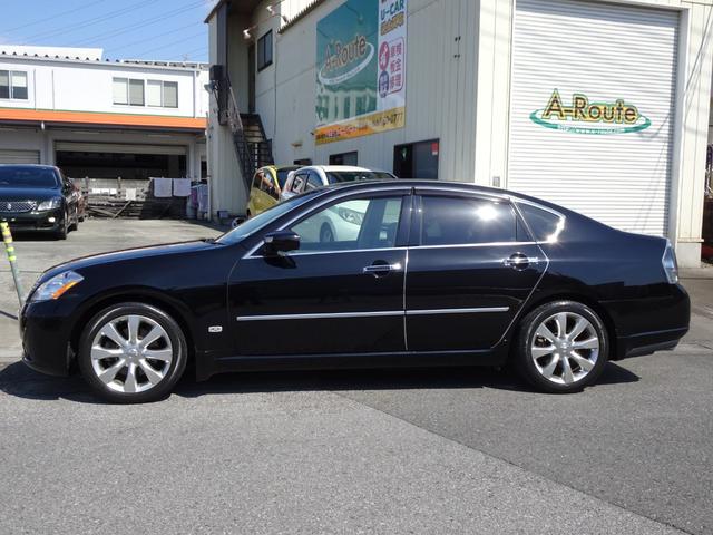 450GT V8エンジン 黒革 OPクリアテール 純正DVDナビ 6連奏CD バック/サイドカメラ シートエアコン 木目調パネル 助手席オットマン インテリキー プッシュスタート 純正18アルミ アナログクロック(9枚目)