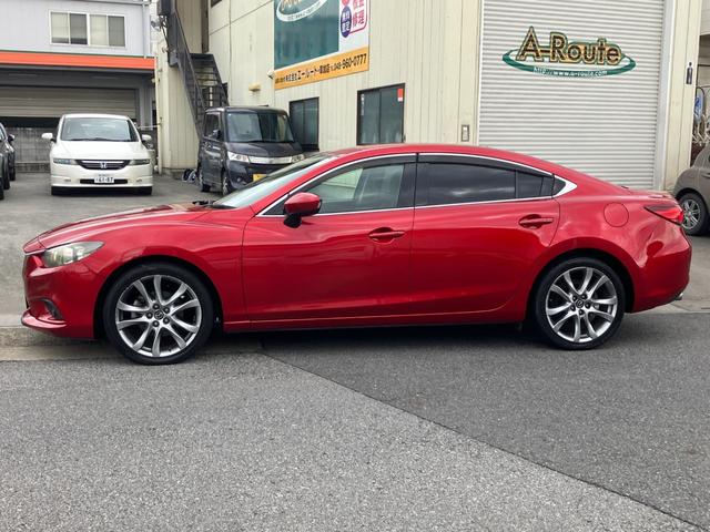 アテンザセダン XD Lパッケージ ディーゼルターボ 6速MT BOSE音響 黒革 衝突軽減ブレーキ レーダークルーズ フリップダウンモニター 社外メモリーナビ CD/DVD再生 Bカメラ トランクスルー スマートキー 純正19アルミ(12枚目)