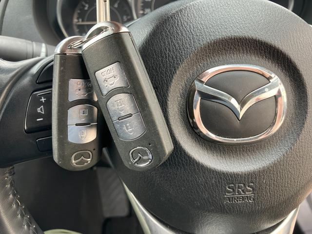 アテンザセダン XD Lパッケージ ディーゼルターボ 6速MT BOSE音響 黒革 衝突軽減ブレーキ レーダークルーズ フリップダウンモニター 社外メモリーナビ CD/DVD再生 Bカメラ トランクスルー スマートキー 純正19アルミ(21枚目)