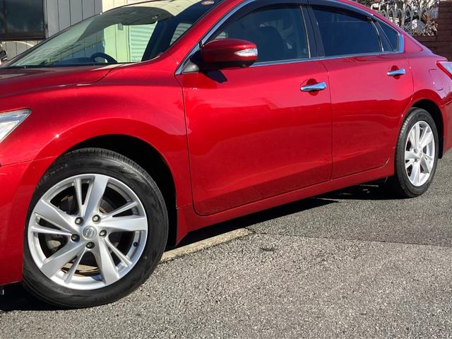 ティアナ XV ナビAVMパッケージ 黒革 サンルーフ 衝突軽減ブレーキ クルコン 全方位カメラ 助手席電動オットマン シートベンチレーション 地デジTV Bluetooth接続 純正メモリーナビ CD/DVD再生 ドラレコ 純正17AW(9枚目)