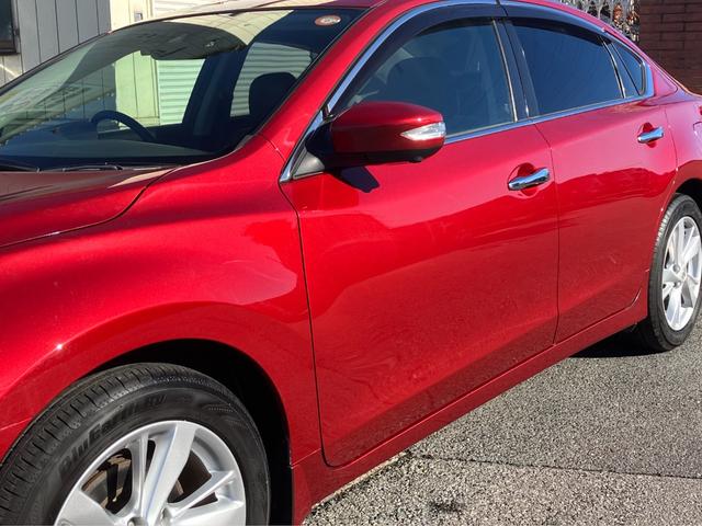 ティアナ XV ナビAVMパッケージ 黒革 サンルーフ 衝突軽減ブレーキ クルコン 全方位カメラ 助手席電動オットマン シートベンチレーション 地デジTV Bluetooth接続 純正メモリーナビ CD/DVD再生 ドラレコ 純正17AW(27枚目)