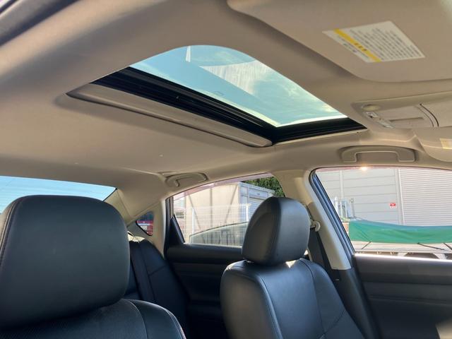 ティアナ XV ナビAVMパッケージ 黒革 サンルーフ 衝突軽減ブレーキ クルコン 全方位カメラ 助手席電動オットマン シートベンチレーション 地デジTV Bluetooth接続 純正メモリーナビ CD/DVD再生 ドラレコ 純正17AW(59枚目)