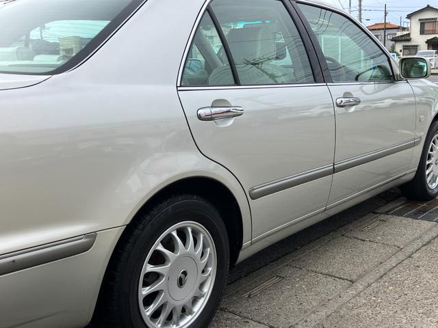 プログレ ＮＣ２５０　ウォールナットパッケージ　前期型　直６／１ＪＺ－ＧＥエンジン　本木パネル　ウッドコンビハンドル　キーレス　純正ＤＶＤナビ　ハーフシートカバー　純正アナログクロック　パワーシート　左右独立Ａ／Ｃ　電動ステアチルト　純正１５アルミ（29枚目）