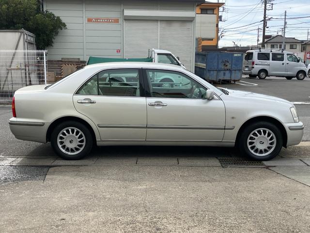 プログレ ＮＣ２５０　ウォールナットパッケージ　前期型　直６／１ＪＺ－ＧＥエンジン　本木パネル　ウッドコンビハンドル　キーレス　純正ＤＶＤナビ　ハーフシートカバー　純正アナログクロック　パワーシート　左右独立Ａ／Ｃ　電動ステアチルト　純正１５アルミ（34枚目）