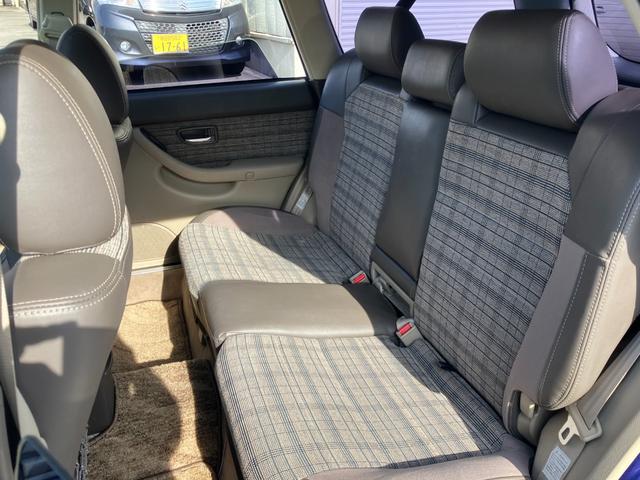 レガシィランカスター ランカスター　水平対向エンジン　デュアルレンジ　５速ＭＴ　サンルーフ　４ＷＤ　ハーフレザー　純正ＭＯＭＯウッドコンビハンドル　ウッド調インパネ　マッキントッシュＣＤ／ＭＤ　キーレス　ＥＴＣ　トノカバー　純正１６ＡＷ（56枚目）