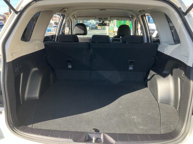 フォレスター 2.0i-L 1オーナー 6速MT 4WD クルコン SI-DRIVE 地デジTV Bluetooth接続 社外メモリーナビ CD/DVD再生 バックカメラ キーレス HID 前後フォグ オートライト 純正17AW(56枚目)