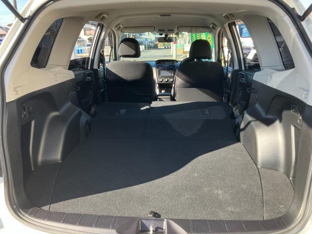 フォレスター 2.0i-L 1オーナー 6速MT 4WD クルコン SI-DRIVE 地デジTV Bluetooth接続 社外メモリーナビ CD/DVD再生 バックカメラ キーレス HID 前後フォグ オートライト 純正17AW(57枚目)