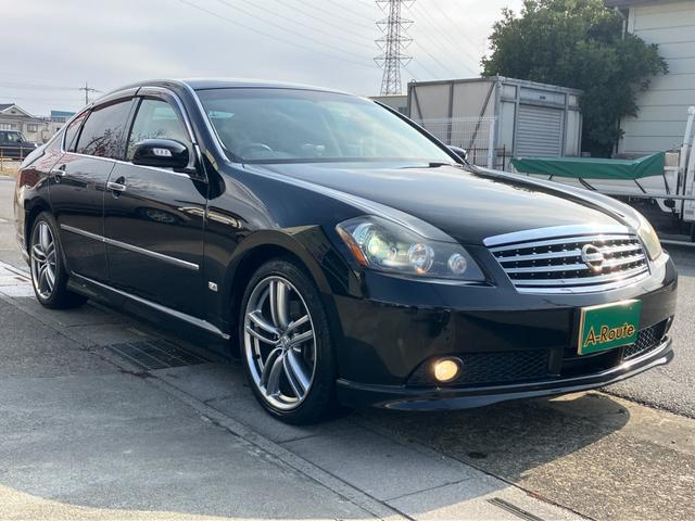 フーガ ＧＴスポーツＰスタイリッシュブラックＬＴＤＩＩ　Ｖ８エンジン　１オーナー　黒革　純正エアロ　純正ＯＰクリアテール　専用１９アルミ　シートベンチレーション　助手席電動オットマン　純正ＤＶＤナビ　６連ＣＤ　バック＆サイドカメラ　スマートキー　キセノン（24枚目）