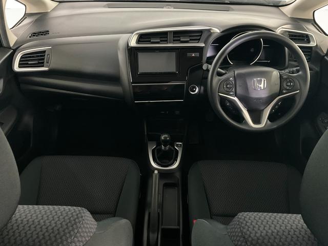 フィット １３Ｇ・Ｆ　５速ＭＴ／ホンダセンシング／衝突軽減／レーンキープ／レーダークルーズ／ＥＴＣ／Ｂｌｕｅｔｏｏｔｈ／バックカメラ／ｉ－ｓｔｏｐ／スマートキー／プッシュＳ／ステアスイッチ／ＬＥＤヘッドランプ／ＬＥＤフォグ（2枚目）