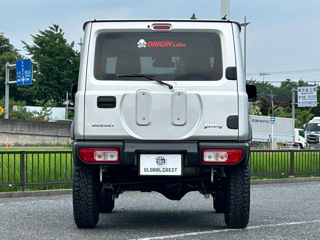 ジムニー ＸＧ　１年保証付　修復歴無　禁煙　運転支援　新車保証書・記録簿　足廻リフトアップ　ＯＲＩＧＩＮ前後バンパー・フロントグリル・オーバーフェンダ　ＯＲＩＧＩＮ１６ＡＷ　ｃａｒｒｏｚｅｒｉａ７型ナビ・ＴＶ　ＥＴＣ（6枚目）