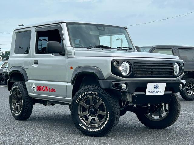 ジムニー ＸＧ　１年保証付　修復歴無　禁煙　運転支援　新車保証書・記録簿　足廻リフトアップ　ＯＲＩＧＩＮ前後バンパー・フロントグリル・オーバーフェンダ　ＯＲＩＧＩＮ１６ＡＷ　ｃａｒｒｏｚｅｒｉａ７型ナビ・ＴＶ　ＥＴＣ（9枚目）