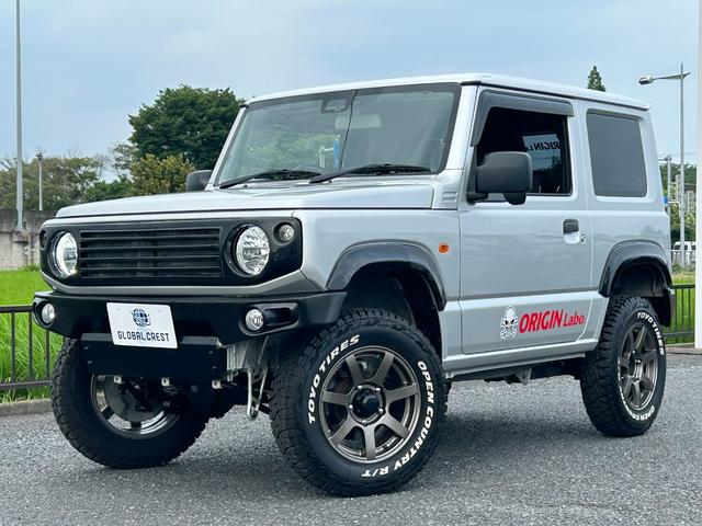 ジムニー ＸＧ　１年保証付　修復歴無　禁煙　運転支援　新車保証書・記録簿　足廻リフトアップ　ＯＲＩＧＩＮ前後バンパー・フロントグリル・オーバーフェンダ　ＯＲＩＧＩＮ１６ＡＷ　ｃａｒｒｏｚｅｒｉａ７型ナビ・ＴＶ　ＥＴＣ（10枚目）