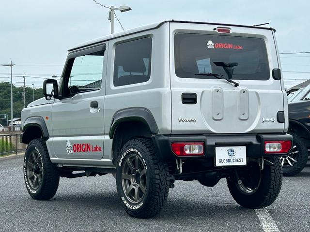ジムニー ＸＧ　１年保証付　修復歴無　禁煙　運転支援　新車保証書・記録簿　足廻リフトアップ　ＯＲＩＧＩＮ前後バンパー・フロントグリル・オーバーフェンダ　ＯＲＩＧＩＮ１６ＡＷ　ｃａｒｒｏｚｅｒｉａ７型ナビ・ＴＶ　ＥＴＣ（12枚目）