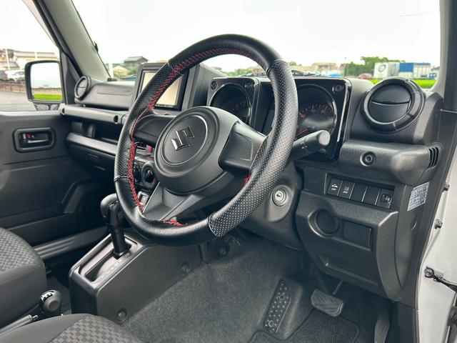 ジムニー ＸＧ　１年保証付　修復歴無　禁煙　運転支援　新車保証書・記録簿　足廻リフトアップ　ＯＲＩＧＩＮ前後バンパー・フロントグリル・オーバーフェンダ　ＯＲＩＧＩＮ１６ＡＷ　ｃａｒｒｏｚｅｒｉａ７型ナビ・ＴＶ　ＥＴＣ（14枚目）