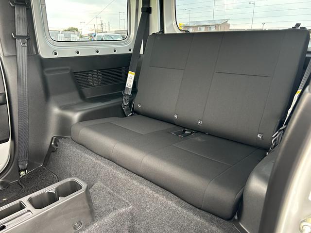 ジムニー ＸＧ　１年保証付　修復歴無　禁煙　運転支援　新車保証書・記録簿　足廻リフトアップ　ＯＲＩＧＩＮ前後バンパー・フロントグリル・オーバーフェンダ　ＯＲＩＧＩＮ１６ＡＷ　ｃａｒｒｏｚｅｒｉａ７型ナビ・ＴＶ　ＥＴＣ（19枚目）