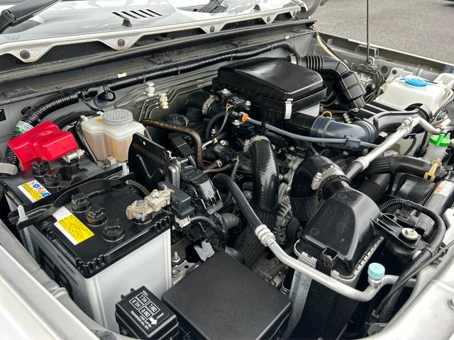 ジムニー ＸＧ　１年保証付　修復歴無　禁煙　運転支援　新車保証書・記録簿　足廻リフトアップ　ＯＲＩＧＩＮ前後バンパー・フロントグリル・オーバーフェンダ　ＯＲＩＧＩＮ１６ＡＷ　ｃａｒｒｏｚｅｒｉａ７型ナビ・ＴＶ　ＥＴＣ（52枚目）