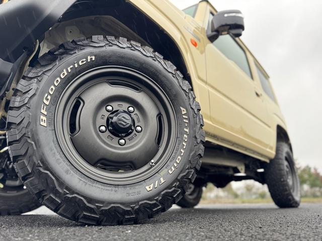 ジムニー XC 修復歴無 DAMDtheROOTSグリル 社外足廻リフトアップサス APIO16inchAW LEDヘッドライト carrozzeria7型ディスプレイオーディオ・Bカメラ シートヒーター 背面タイヤ(56枚目)