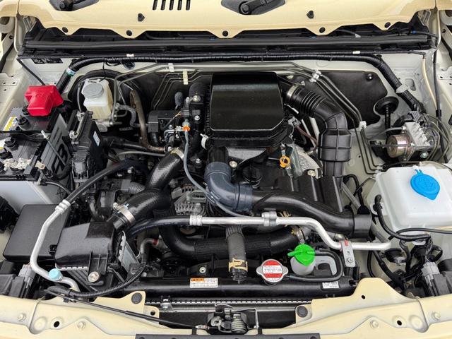ジムニー XC 修復歴無 DAMDtheROOTSグリル 社外足廻リフトアップサス APIO16inchAW LEDヘッドライト carrozzeria7型ディスプレイオーディオ・Bカメラ シートヒーター 背面タイヤ(61枚目)