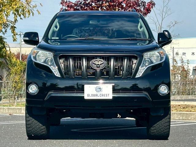 ランドクルーザープラド TX 新車保証書・記録簿 修復無 ONESAS2インチリフトアップ KMC20inchAW サイドステップ ルーフレール リアスポイラー マルチテレインセレクト 黒レザーシートカバー ETC スマートキー(7枚目)