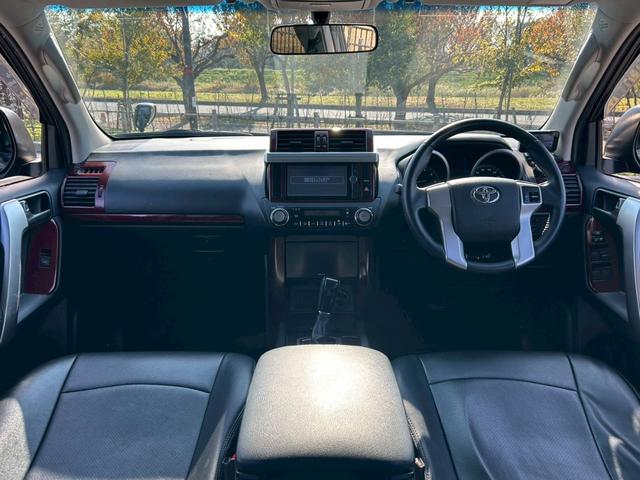 ランドクルーザープラド TX 新車保証書・記録簿 修復無 ONESAS2インチリフトアップ KMC20inchAW サイドステップ ルーフレール リアスポイラー マルチテレインセレクト 黒レザーシートカバー ETC スマートキー(15枚目)