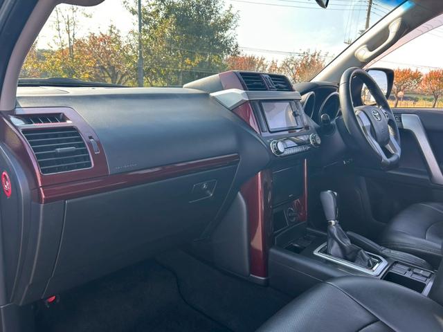 ランドクルーザープラド TX 新車保証書・記録簿 修復無 ONESAS2インチリフトアップ KMC20inchAW サイドステップ ルーフレール リアスポイラー マルチテレインセレクト 黒レザーシートカバー ETC スマートキー(17枚目)