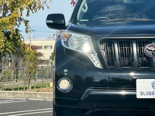 ランドクルーザープラド TX 新車保証書・記録簿 修復無 ONESAS2インチリフトアップ KMC20inchAW サイドステップ ルーフレール リアスポイラー マルチテレインセレクト 黒レザーシートカバー ETC スマートキー(35枚目)
