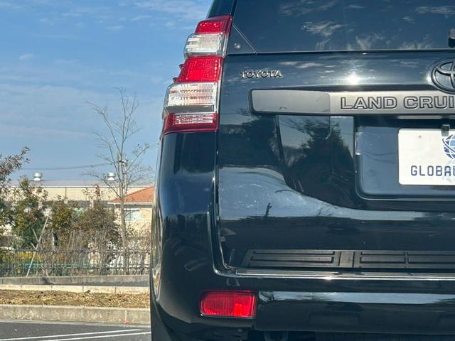 ランドクルーザープラド TX 新車保証書・記録簿 修復無 ONESAS2インチリフトアップ KMC20inchAW サイドステップ ルーフレール リアスポイラー マルチテレインセレクト 黒レザーシートカバー ETC スマートキー(39枚目)