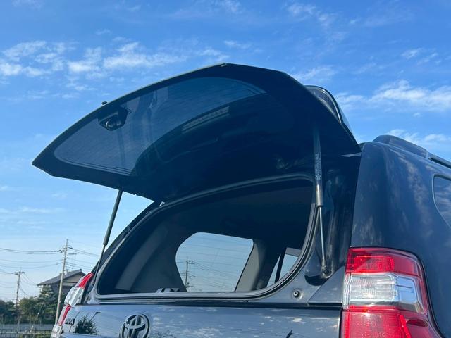 ランドクルーザープラド TX 新車保証書・記録簿 修復無 ONESAS2インチリフトアップ KMC20inchAW サイドステップ ルーフレール リアスポイラー マルチテレインセレクト 黒レザーシートカバー ETC スマートキー(48枚目)