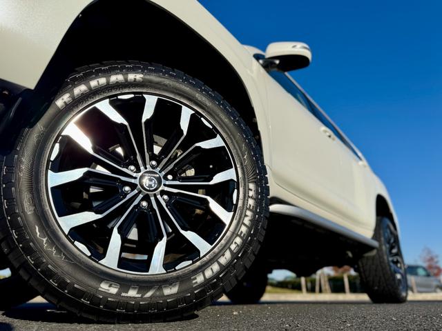 ランドクルーザープラド ＴＸ　Ｌパッケージ　修復無　ＤＵＢＬＥ　ＥＩＧＨＴフロントグリル　サンルーフ　リフトアップ社外足回り　ＴＺ－Ｇ用サイドステップ　プロコンプショックＡＬＰＩＮＥ９インチナビ　シートヒーター　パワーシート　クリアランスソナー（65枚目）