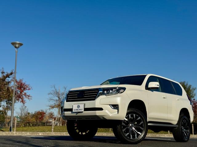 ランドクルーザープラド ＴＸ　Ｌパッケージ　修復無　ＤＵＢＬＥ　ＥＩＧＨＴフロントグリル　サンルーフ　リフトアップ社外足回り　ＴＺ－Ｇ用サイドステップ　プロコンプショックＡＬＰＩＮＥ９インチナビ　シートヒーター　パワーシート　クリアランスソナー（71枚目）