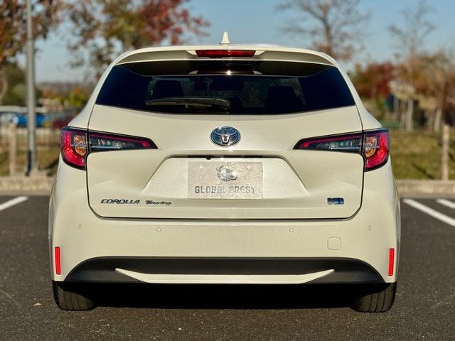 カローラツーリング ハイブリッド　Ｇ－Ｘ　プラス　ユーザー様買取車　特別仕様　禁煙車　修復歴無　運転支援　ＬＥＤヘッドライト　Ｆフォグ　コーナーセンサー　レーダークルコン　純正ディスプレイオーディオ　純正マット　トノカバー　ＥＴＣ２．０　スマートキー（8枚目）