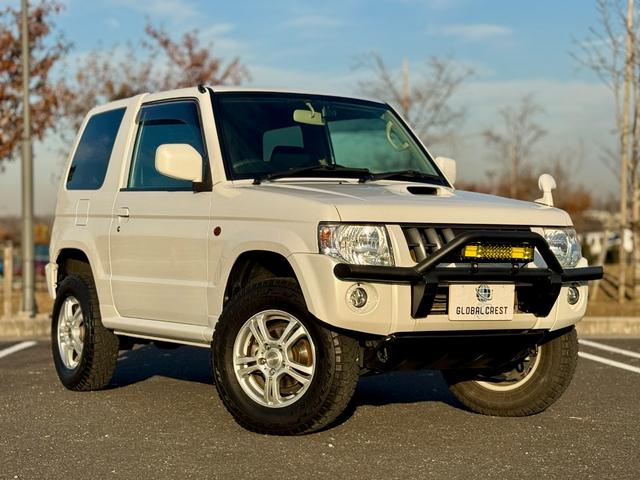 キックス RX 全国対応1年保証付 4速A/T・ターボ 4WD リフトアップ 社外15AW 社外ラテラルロッド パイプガード LED作業灯 フォグランプ ドアバイザー ディスプレイオーディオ キーレス 電動格納ミラー(11枚目)