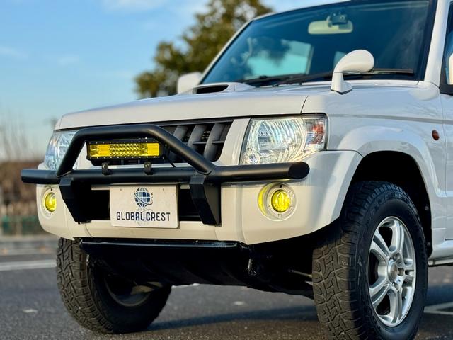 キックス RX 全国対応1年保証付 4速A/T・ターボ 4WD リフトアップ 社外15AW 社外ラテラルロッド パイプガード LED作業灯 フォグランプ ドアバイザー ディスプレイオーディオ キーレス 電動格納ミラー(39枚目)