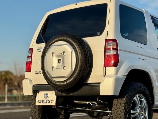 キックス RX 全国対応1年保証付 4速A/T・ターボ 4WD リフトアップ 社外15AW 社外ラテラルロッド パイプガード LED作業灯 フォグランプ ドアバイザー ディスプレイオーディオ キーレス 電動格納ミラー(42枚目)